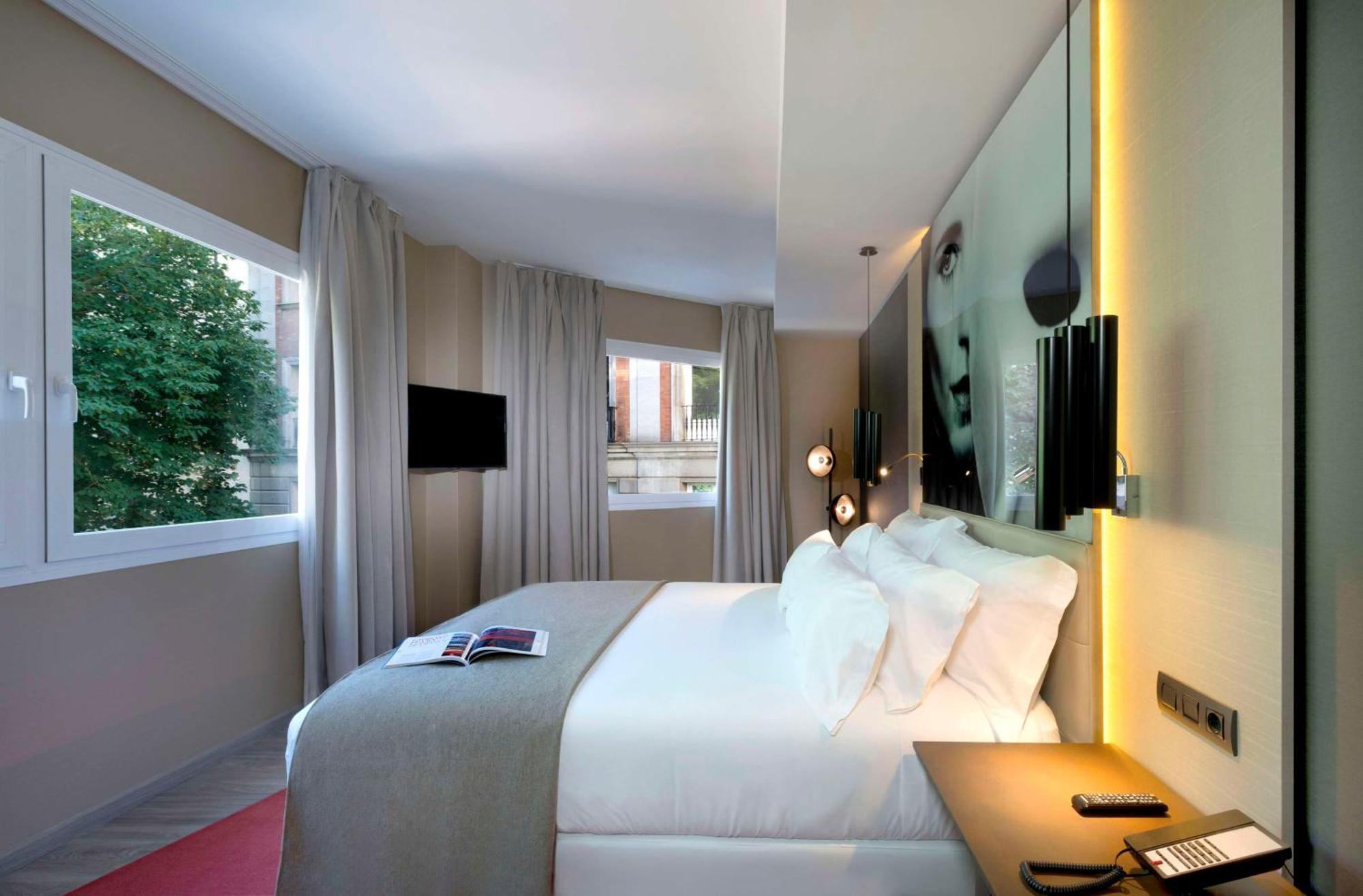 Nh Collection Madrid Suecia Hotel Bagian luar foto A room at the hotel