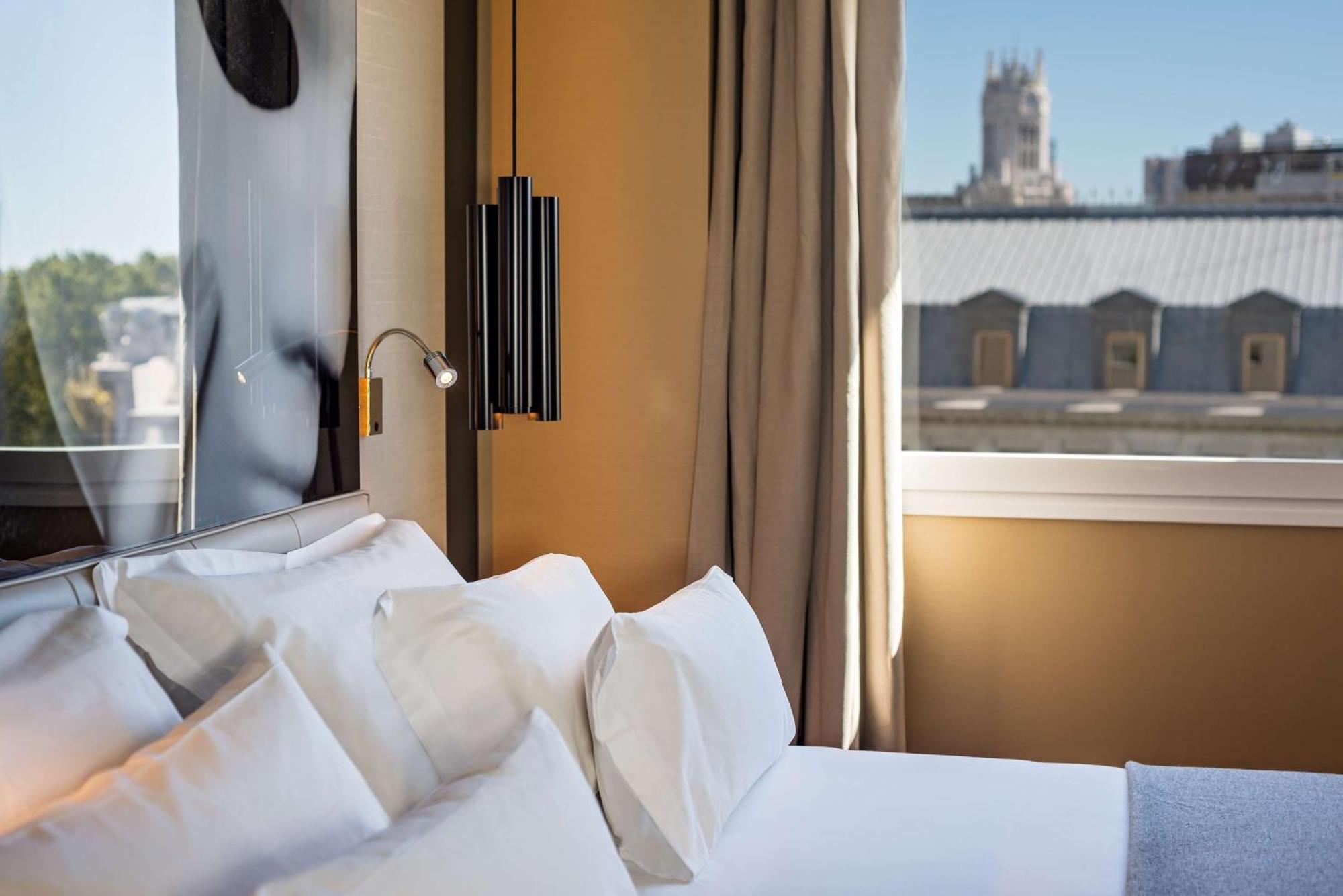 Nh Collection Madrid Suecia Hotel Bagian luar foto A room at the hotel