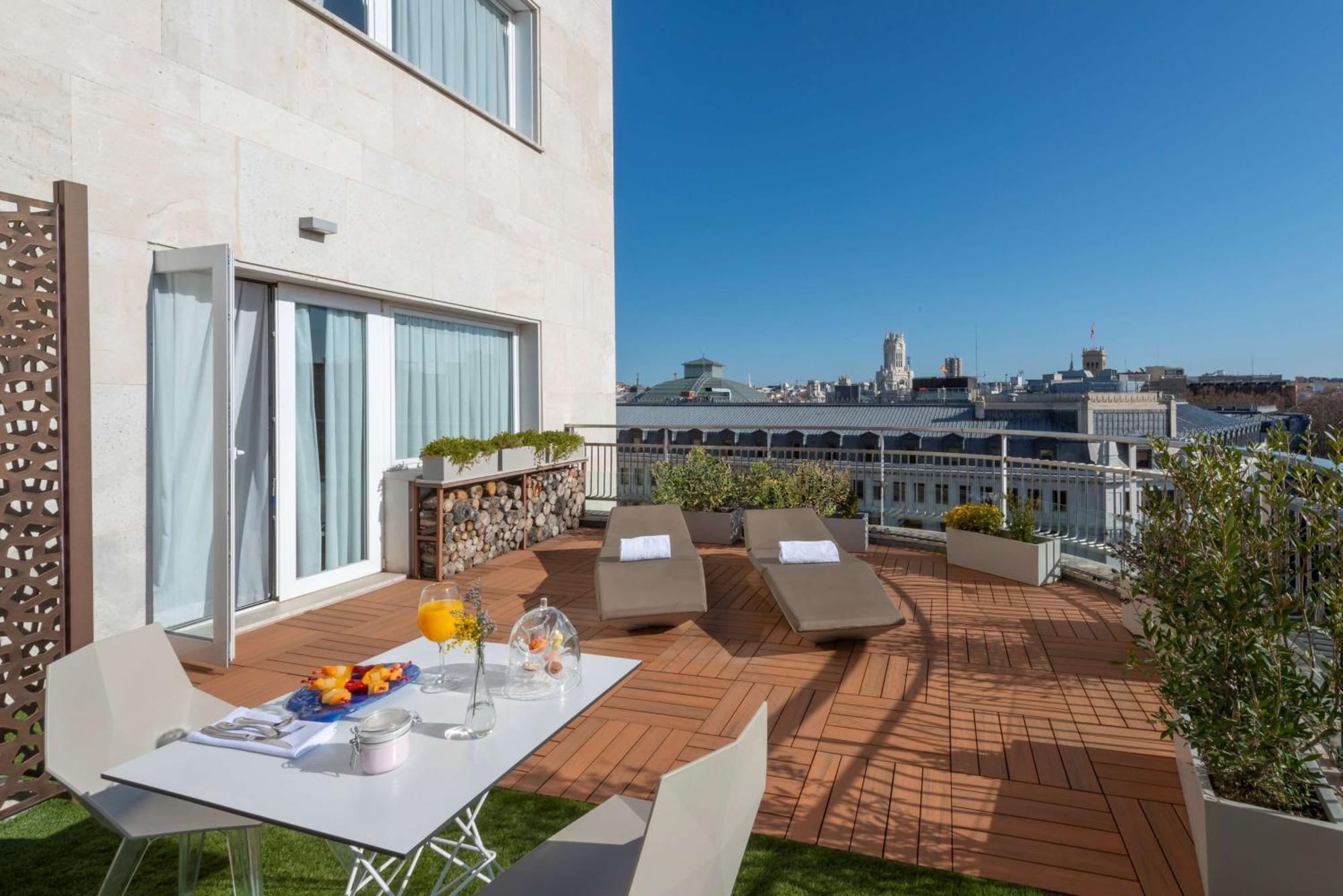 Nh Collection Madrid Suecia Hotel Bagian luar foto The hotel's rooftop terrace